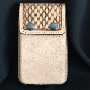 Handmade all leather cell phone carrier.